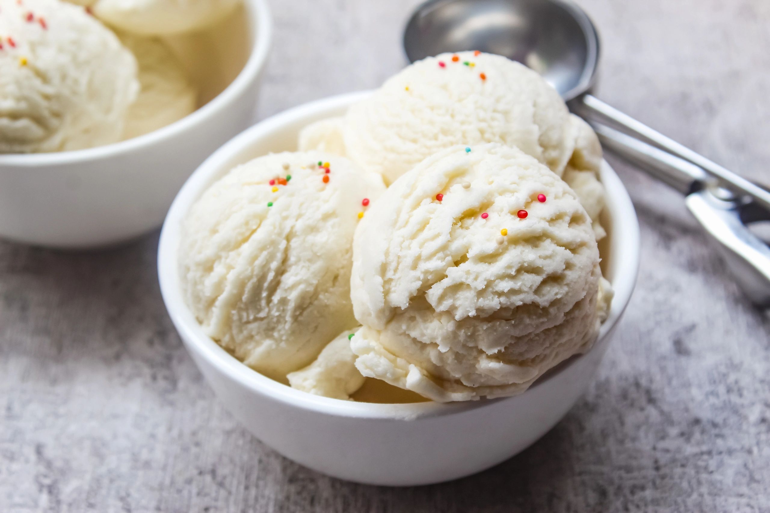 Vanilla ice cream with sprinkles in a bowl