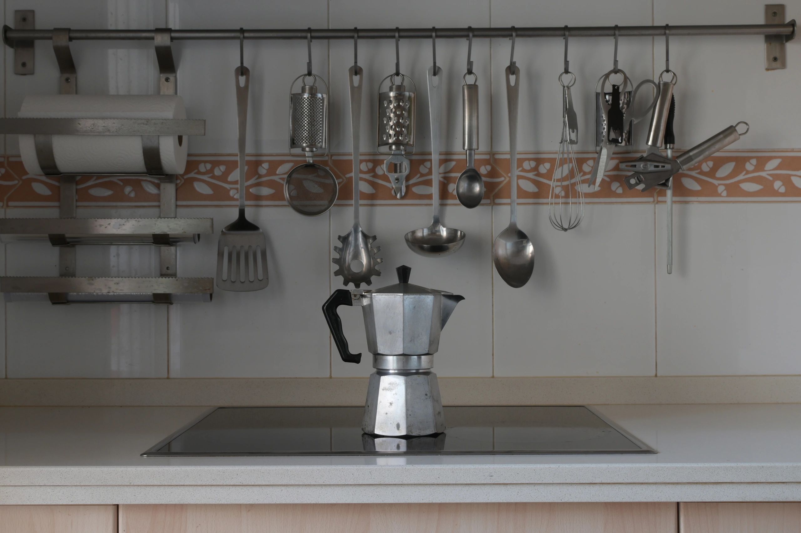 Moka pot on a modern stovetop
