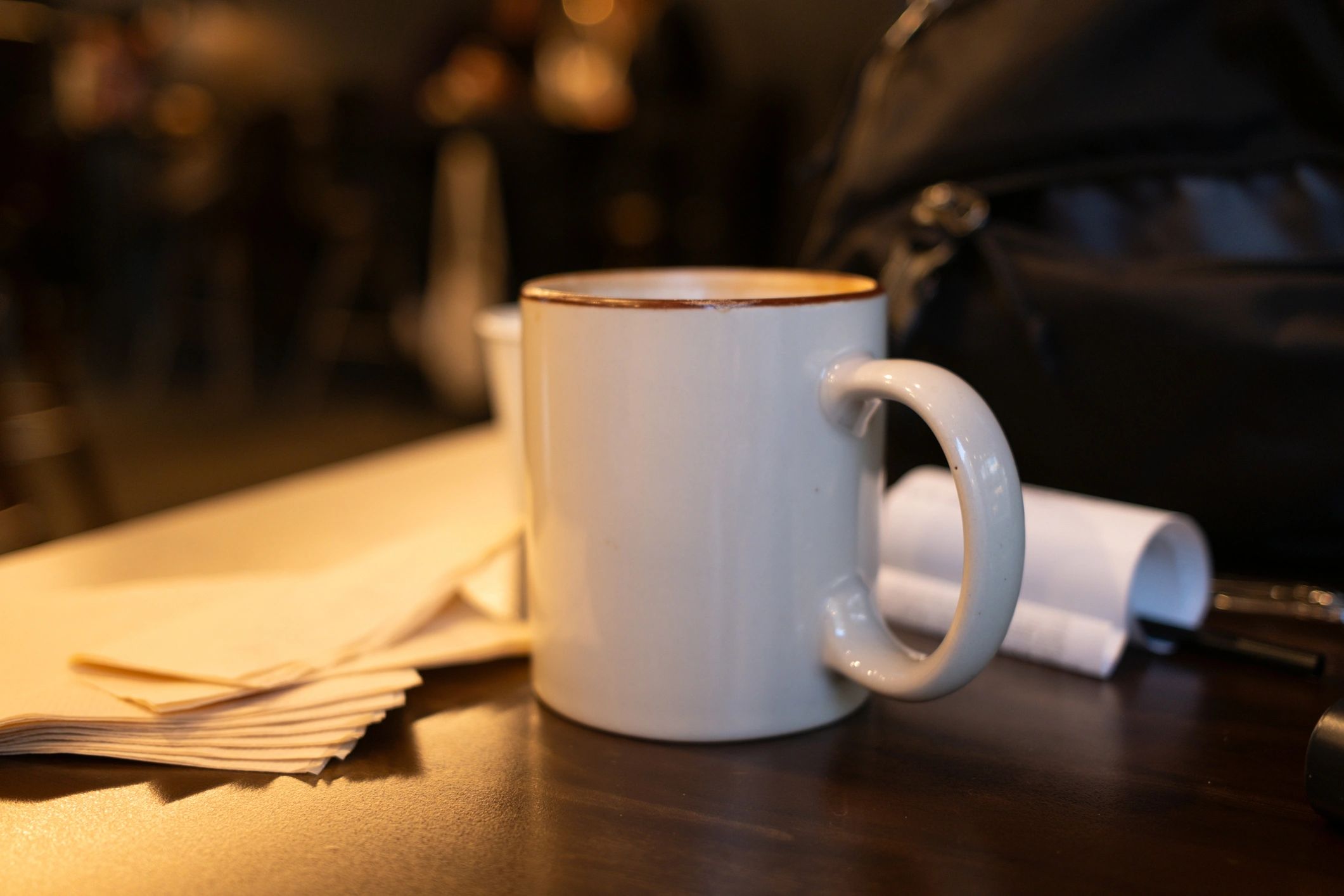 White coffee mug on a cafe table